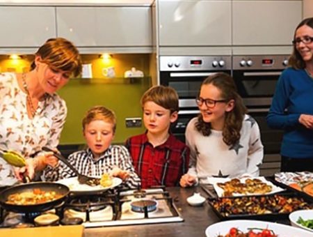 Cooking together in a self catering holiday cottage