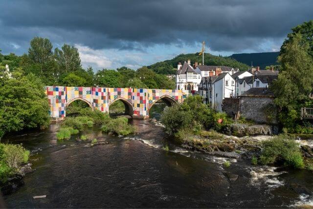 Llangollen bridge covered in flags for the International Music Eisteddfod