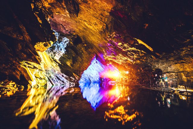 A light up cavern during the Zip World Deep Mine Tour