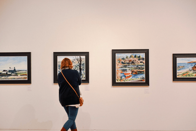 woman looking at art 