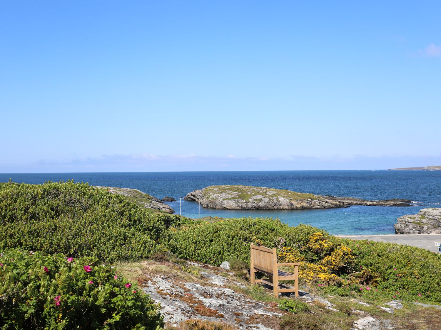 Beautiful sea view with wooden bench 